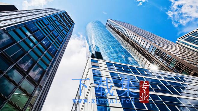 蓝天白云下的现代化商务建筑PPT背景图片